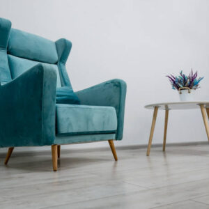 Elegant green armchair and coffee table